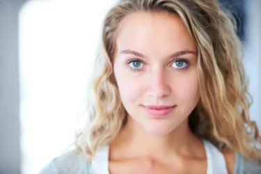 iStock-179169610-1-e1637834162653 A young blonde woman staring into the camera